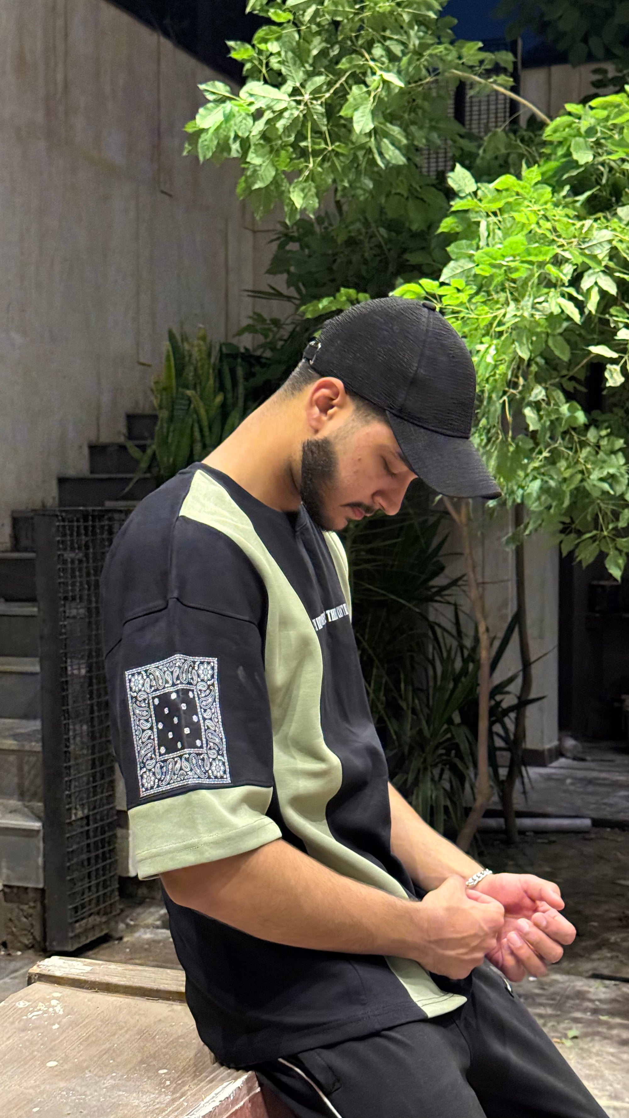 green and black drop shoulder shirt