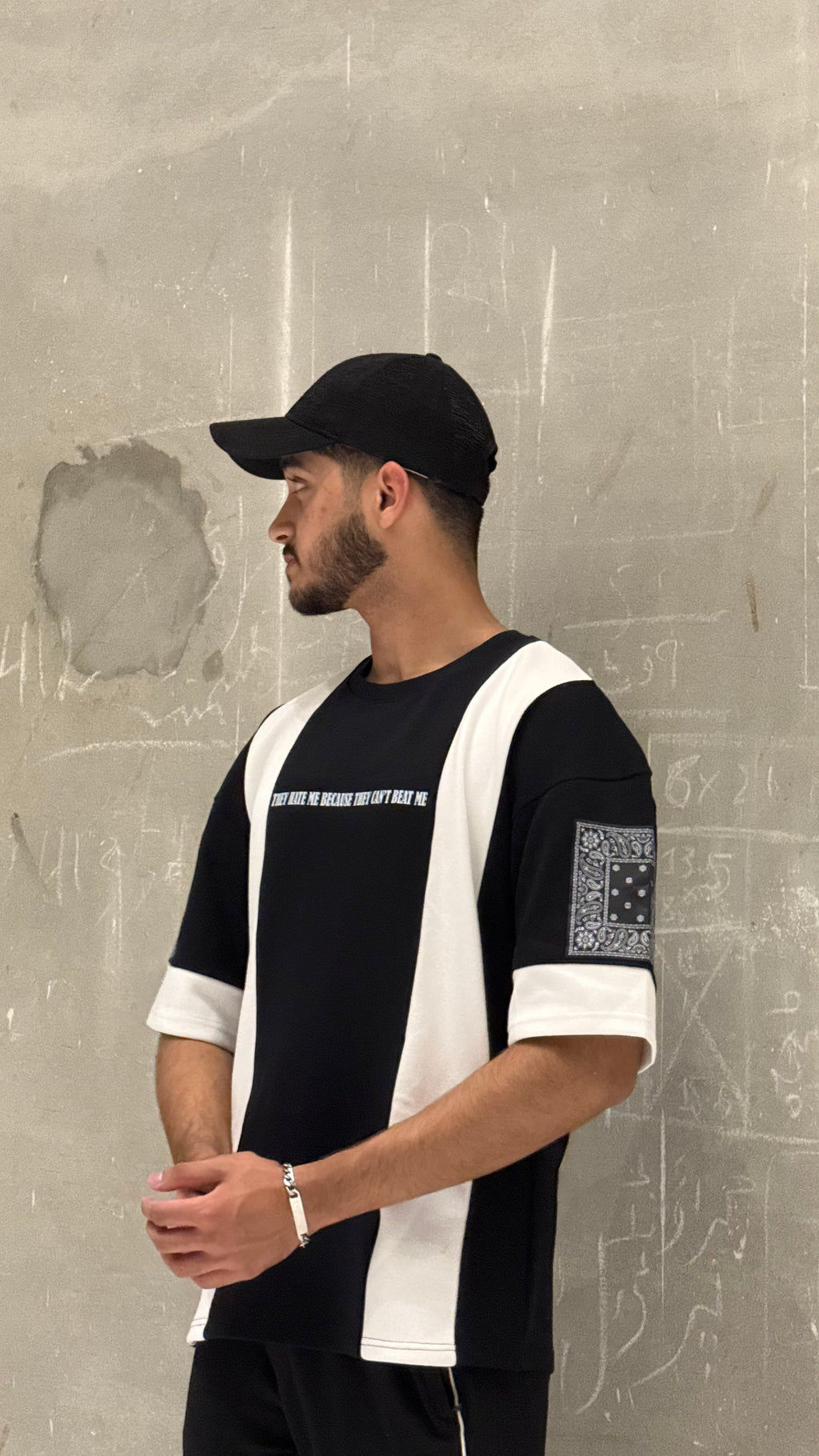 white and black drop shoulder shirt