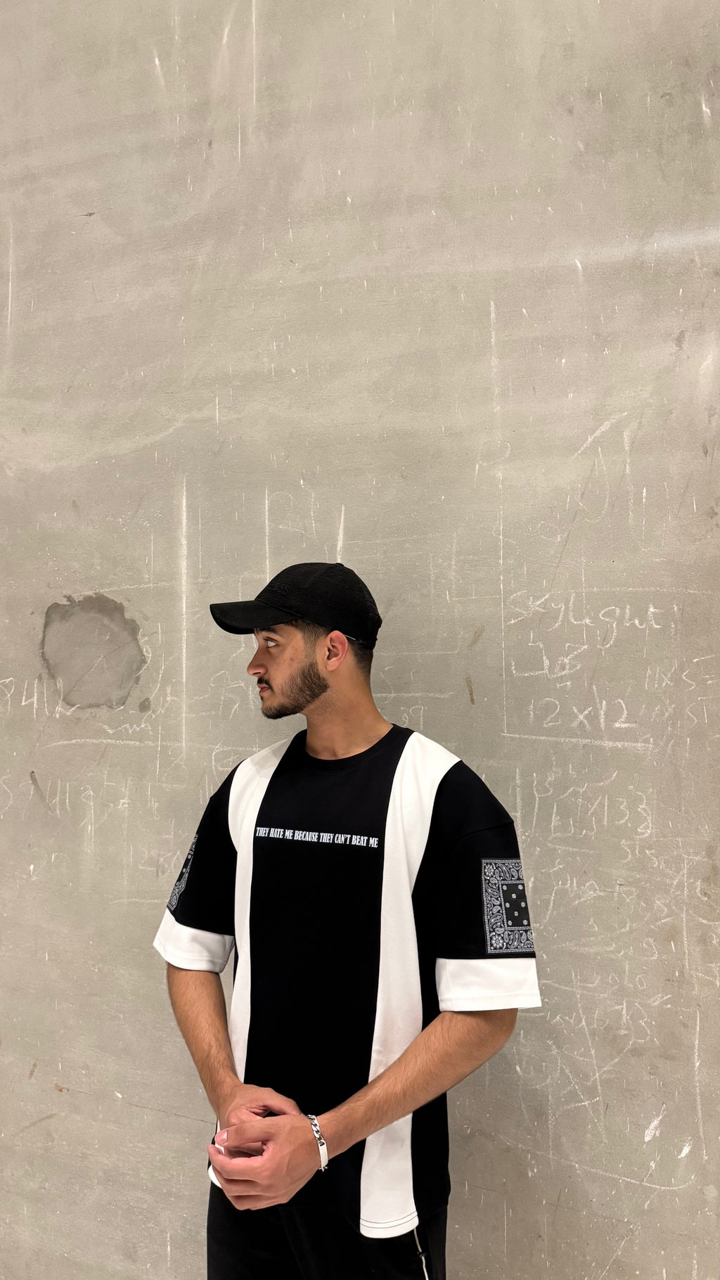 white and black drop shoulder shirt