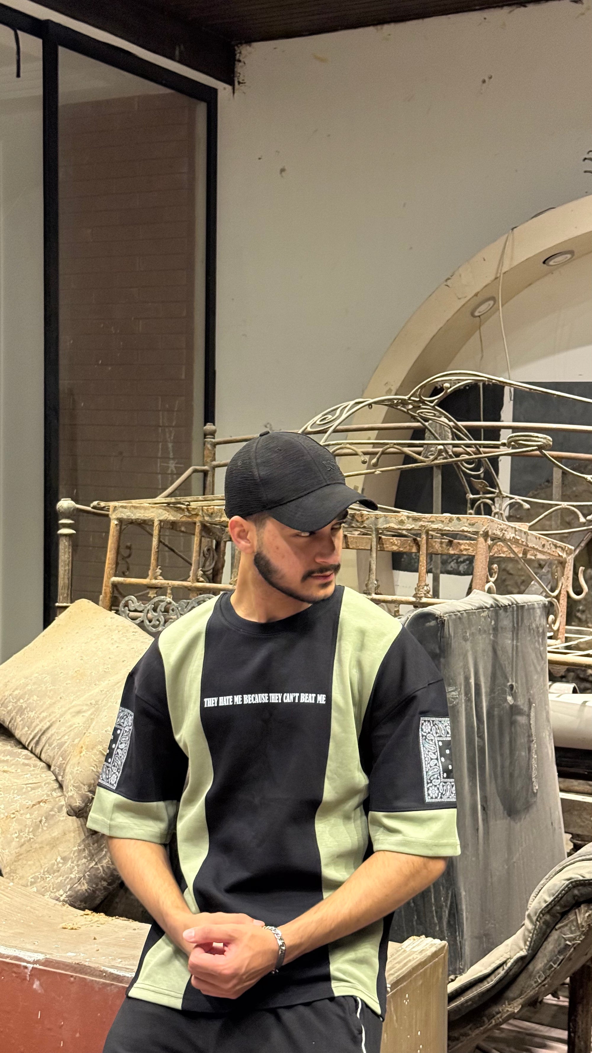 green and black drop shoulder shirt